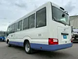 2018 Toyota Coaster Microbus White Color changed Van for sale, Japanese used car export - photo 4 of 60 | GULJI TRADERS