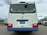 2018 Toyota Coaster Microbus White Color changed Van for sale, Japanese used car export - photo 9 of 60 | GULJI TRADERS