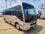 2018 Toyota Coaster EX Gold Van for sale, Japanese used car export - photo 1 of 8 | GULJI TRADERS