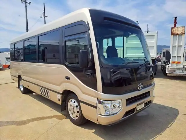 2018 Toyota Coaster EX Gold Van for sale, Japanese used car export - photo 1 of 8 | GULJI TRADERS