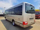 2018 Toyota Coaster EX Gold Van for sale, Japanese used car export - photo 2 of 8 | GULJI TRADERS