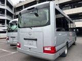 2018 Toyota Coaster GX Sedan for sale, Japanese used car export - photo 2 of 7 | GULJI TRADERS