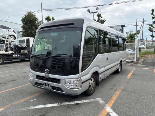 2018 Toyota Coaster GX - photo 1 2018 Toyota Coaster GX Sedan for sale, Japanese used car export - photo 1 of 9 | GULJI TRADERS