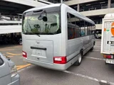 2018 Toyota Coaster GX Sedan for sale, Japanese used car export - photo 2 of 9 | GULJI TRADERS