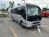 2018 Toyota Coaster GX Sedan for sale, Japanese used car export - photo 3 of 9 | GULJI TRADERS