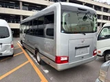 2018 Toyota Coaster GX Sedan for sale, Japanese used car export - photo 4 of 9 | GULJI TRADERS