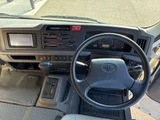 2018 Toyota Coaster Sedan for sale, Japanese used car export - photo 8 of 13 | GULJI TRADERS