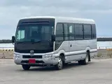 2018 Toyota Coaster GX Silver Van for sale, Japanese used car export - photo 1 of 21 | GULJI TRADERS