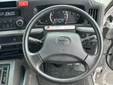 2018 Toyota Coaster GX Silver Van for sale, Japanese used car export - photo 16 of 21 | GULJI TRADERS