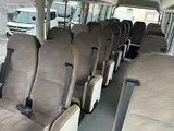 2018 Toyota Coaster GX Silver Van for sale, Japanese used car export - photo 20 of 21 | GULJI TRADERS
