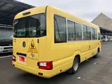 2019 Toyota Coaster Long 3+49/1.5-seater infant bus with automatic doors Yellow Van for sale, Japanese used car export - photo 2 of 45 | GULJI TRADERS