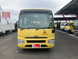 2019 Toyota Coaster Long 3+49/1.5-seater infant bus with automatic doors Yellow Van for sale, Japanese used car export - photo 4 of 45 | GULJI TRADERS