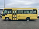 2019 Toyota Coaster Long 3+49/1.5-seater infant bus with automatic doors Yellow Van for sale, Japanese used car export - photo 6 of 45 | GULJI TRADERS