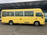 2019 Toyota Coaster Long 3+49/1.5-seater infant bus with automatic doors Yellow Van for sale, Japanese used car export - photo 7 of 45 | GULJI TRADERS