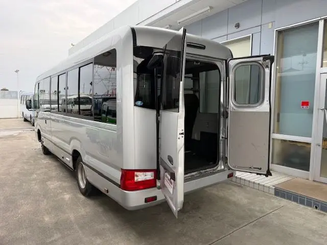 2019 Toyota Coaster 24-seater late model GX long rear double door AT automatic door Rikumoke seat Silver Van for sale, Japanese used car export | GULJI TRADERS