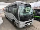 2019 Toyota Coaster 24-seater late model GX long rear double door AT automatic door Rikumoke seat Silver Van for sale, Japanese used car export - photo 2 of 36 | GULJI TRADERS