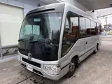 2019 Toyota Coaster 24-seater late model GX long rear double door AT automatic door Rikumoke seat Silver Van for sale, Japanese used car export - photo 4 of 36 | GULJI TRADERS