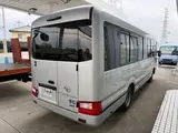 2019 Toyota Coaster 24-seater late model GX long rear double door AT automatic door Rikumoke seat Silver Van for sale, Japanese used car export - photo 5 of 36 | GULJI TRADERS