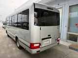 2019 Toyota Coaster 24-seater late model GX long rear double door AT automatic door Rikumoke seat Silver Van for sale, Japanese used car export - photo 6 of 36 | GULJI TRADERS