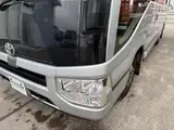 2019 Toyota Coaster 24-seater late model GX long rear double door AT automatic door Rikumoke seat Silver Van for sale, Japanese used car export - photo 12 of 36 | GULJI TRADERS
