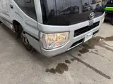 2019 Toyota Coaster 24-seater late model GX long rear double door AT automatic door Rikumoke seat Silver Van for sale, Japanese used car export - photo 25 of 36 | GULJI TRADERS
