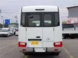 2019 Toyota Coaster Microbus LX Long, 24-seater, rear double doors, automatic doors, automatic transmission. White Van for sale, Japanese used car export - photo 5 of 51 | GULJI TRADERS