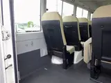 2019 Toyota Coaster Microbus LX Long, 24-seater, rear double doors, automatic doors, automatic transmission. White Van for sale, Japanese used car export - photo 8 of 51 | GULJI TRADERS