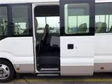 2019 Toyota Coaster Microbus LX Long, 24-seater, rear double doors, automatic doors, automatic transmission. White Van for sale, Japanese used car export - photo 11 of 51 | GULJI TRADERS