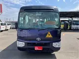 2019 Toyota Coaster Toddler bus 3+39/1.5 people automatic door Purple Color changed Van for sale, Japanese used car export - photo 4 of 54 | GULJI TRADERS