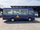2019 Toyota Coaster Toddler bus 3+39/1.5 people automatic door Purple Color changed Van for sale, Japanese used car export - photo 7 of 54 | GULJI TRADERS