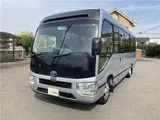 2019 Toyota Coaster GX 24-seater, double doors, cold weather specifications, auto-glide doors Silver Van for sale, Japanese used car export - photo 1 of 55 | GULJI TRADERS