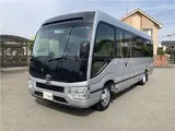 2019 Toyota Coaster GX 24-seater, double doors, cold weather specifications, auto-glide doors Silver Van for sale, Japanese used car export - photo 3 of 55 | GULJI TRADERS