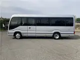 2019 Toyota Coaster GX 24-seater, double doors, cold weather specifications, auto-glide doors Silver Van for sale, Japanese used car export - photo 4 of 55 | GULJI TRADERS