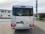 2019 Toyota Coaster GX 24-seater, double doors, cold weather specifications, auto-glide doors Silver Van for sale, Japanese used car export - photo 6 of 55 | GULJI TRADERS