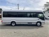 2019 Toyota Coaster GX 24-seater, double doors, cold weather specifications, auto-glide doors Silver Van for sale, Japanese used car export - photo 8 of 55 | GULJI TRADERS