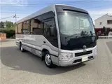 2019 Toyota Coaster GX 24-seater, double doors, cold weather specifications, auto-glide doors Silver Van for sale, Japanese used car export - photo 9 of 55 | GULJI TRADERS