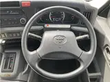 2019 Toyota Coaster GX 24-seater, double doors, cold weather specifications, auto-glide doors Silver Van for sale, Japanese used car export - photo 25 of 55 | GULJI TRADERS