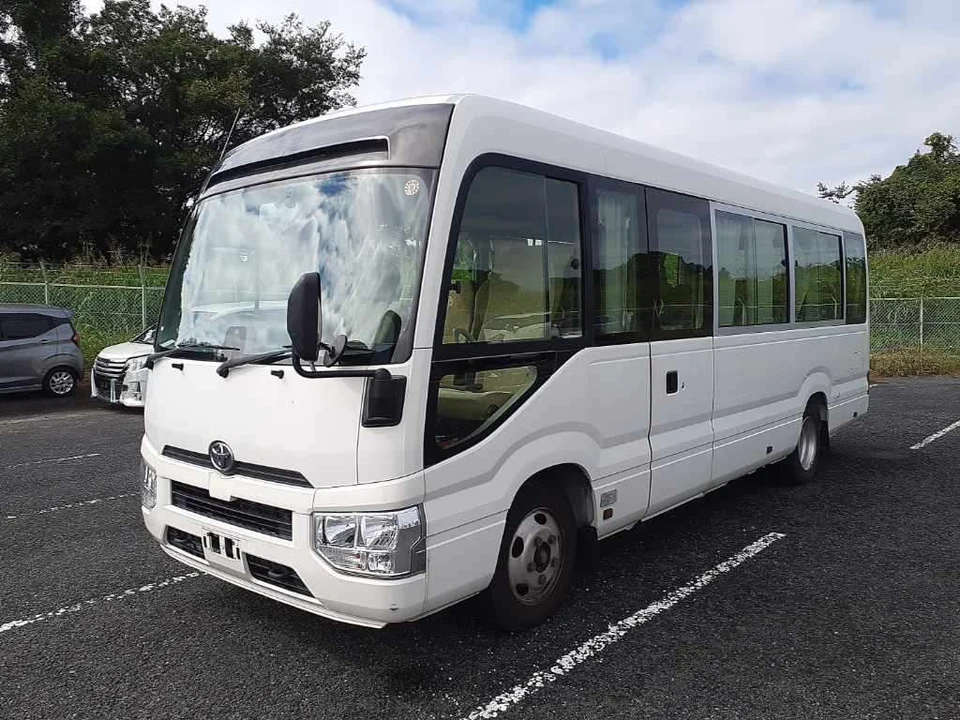 2019 Toyota Coaster LX - photo 1 2019 Toyota Coaster LX SUV for sale, Japanese used car export - photo 1 of 10 | GULJI TRADERS
