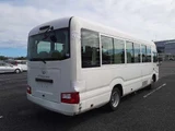 2019 Toyota Coaster LX SUV for sale, Japanese used car export - photo 2 of 10 | GULJI TRADERS