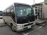 2019 Toyota Coaster EX Sedan for sale, Japanese used car export - photo 1 of 33 | GULJI TRADERS