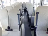 2020 Toyota Coaster Microbus LX Long 29-seater with automatic swing doors, collision mitigation, and automatic transmission. White Van for sale, Japanese used car export - photo 39 of 51 | GULJI TRADERS