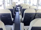 2020 Toyota Coaster Microbus LX Long 29-seater with automatic swing doors, collision mitigation, and automatic transmission. White Van for sale, Japanese used car export - photo 40 of 51 | GULJI TRADERS
