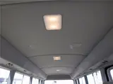 2020 Toyota Coaster Microbus LX Long 29-seater with automatic swing doors, collision mitigation, and automatic transmission. White Van for sale, Japanese used car export - photo 44 of 51 | GULJI TRADERS