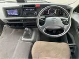 2021 Toyota Coaster GX 29 people Silver Van for sale, Japanese used car export - photo 3 of 3 | GULJI TRADERS