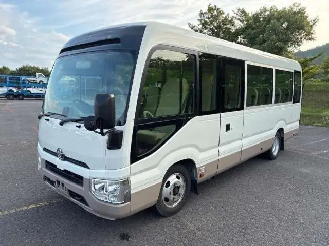 2021 Toyota Coaster LX White Van for sale, Japanese used car export | GULJI TRADERS