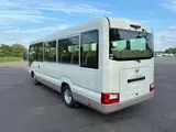 2021 Toyota Coaster LX White Van for sale, Japanese used car export - photo 4 of 13 | GULJI TRADERS