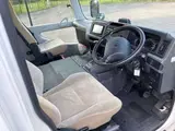 2021 Toyota Coaster LX White Van for sale, Japanese used car export - photo 5 of 13 | GULJI TRADERS