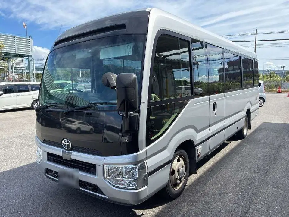 2021 Toyota Coaster GX Silver Van for sale, Japanese used car export - photo 1 of 2 | GULJI TRADERS