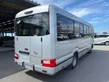 2021 Toyota Coaster GX Silver Van for sale, Japanese used car export - photo 2 of 2 | GULJI TRADERS