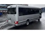 2023 Toyota Coaster GX Silver Van for sale, Japanese used car export - photo 2 of 4 | GULJI TRADERS